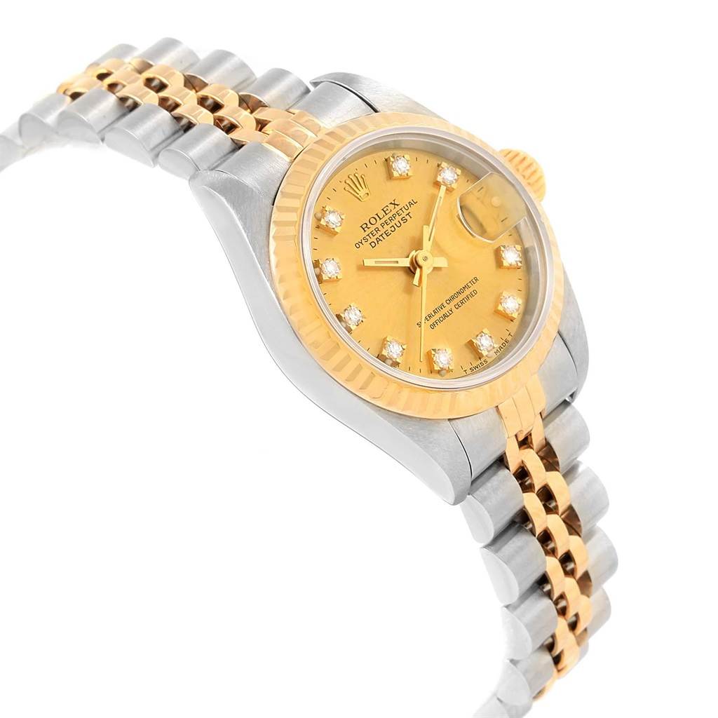 The Rolex Datejust 69173 Women's Stainless Steel Champagne Dial 69173 Women's Stainless Steel Champagne Dial watch is shown at a slight angle, displaying its two-tone bracelet, gold dial with diamond markers, and fluted bezel.