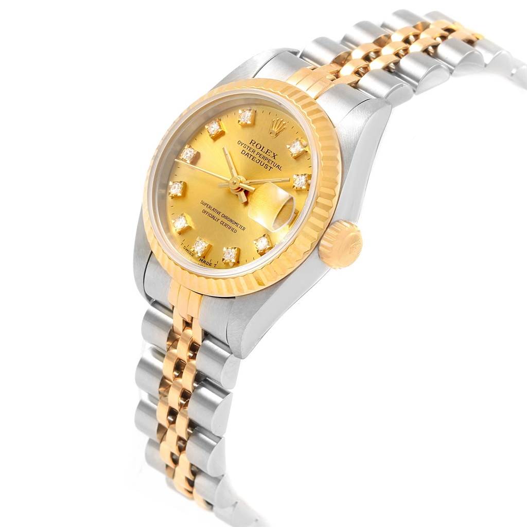 This image shows a Rolex Datejust 69173 Women's Stainless Steel Champagne Dial 69173 Women's Stainless Steel Champagne Dial watch taken at a three-quarter angle, highlighting its gold and silver bracelet and detailed face.