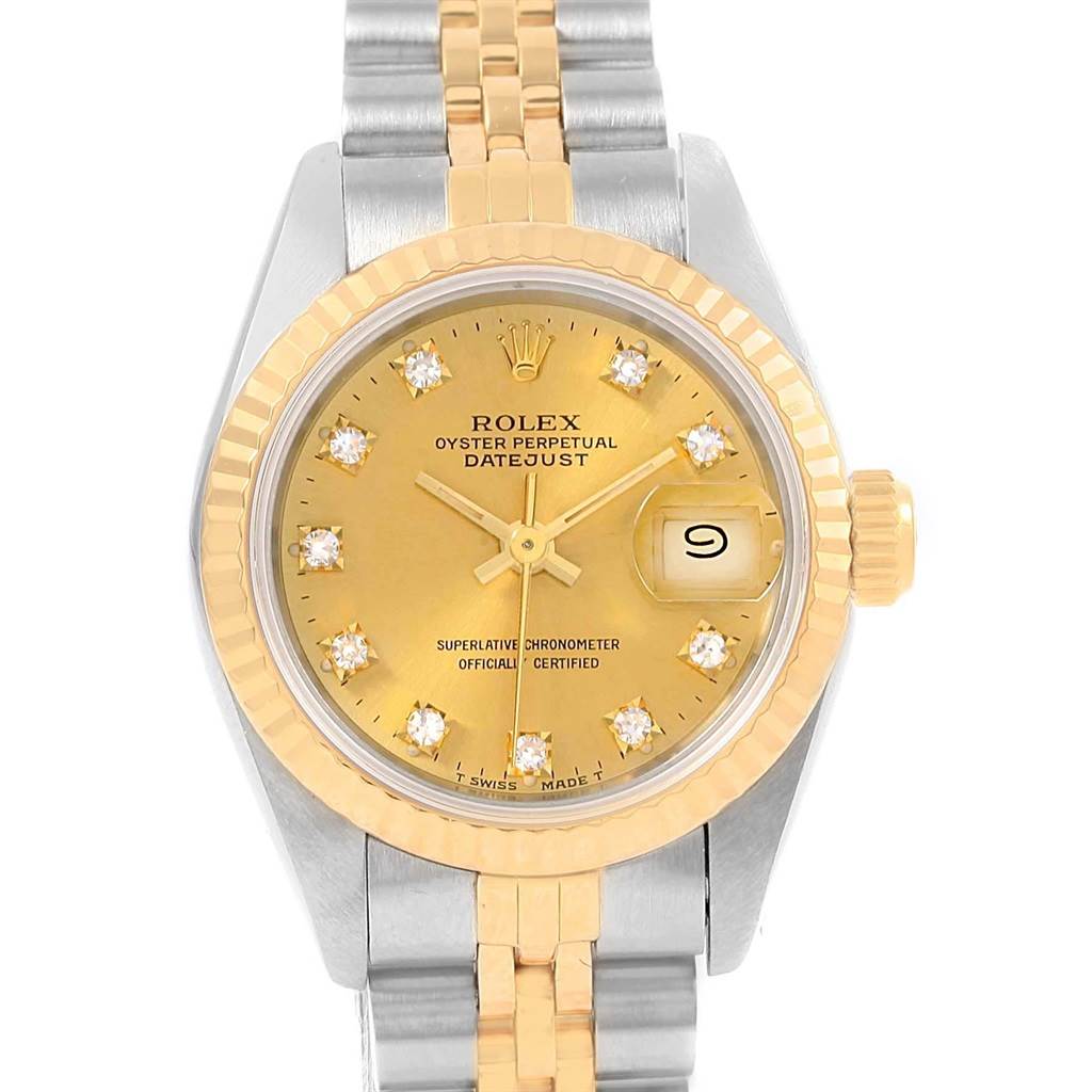 This Rolex Datejust 69173 Women's Stainless Steel Champagne Dial 69173 Women's Stainless Steel Champagne Dial watch is shown from a top-down angle, highlighting its gold dial, diamond hour markers, and two-tone bracelet.