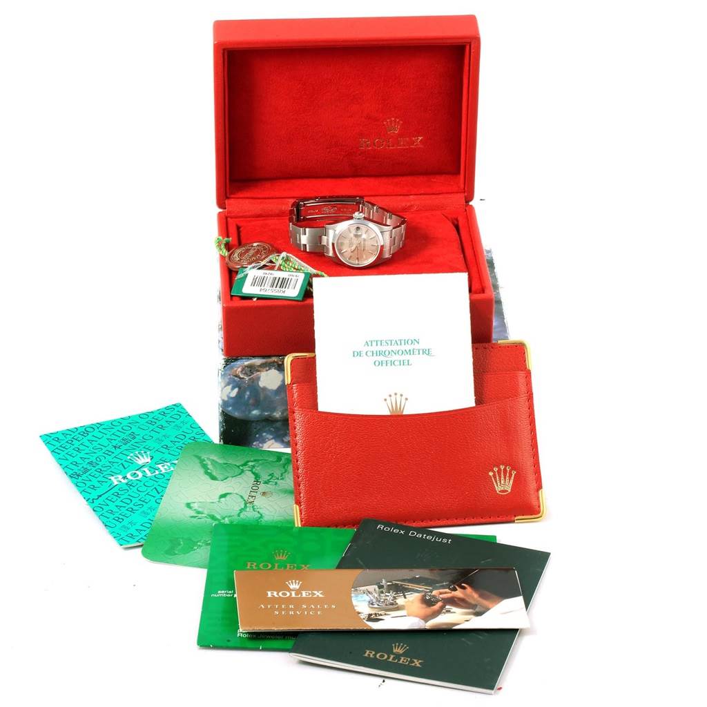 The image shows a Rolex Datejust 79160 Women's Stainless Steel Silver Dial 79160 Women's Stainless Steel Silver Dial watch in its open box, accompanied by various manuals and authenticity documents.