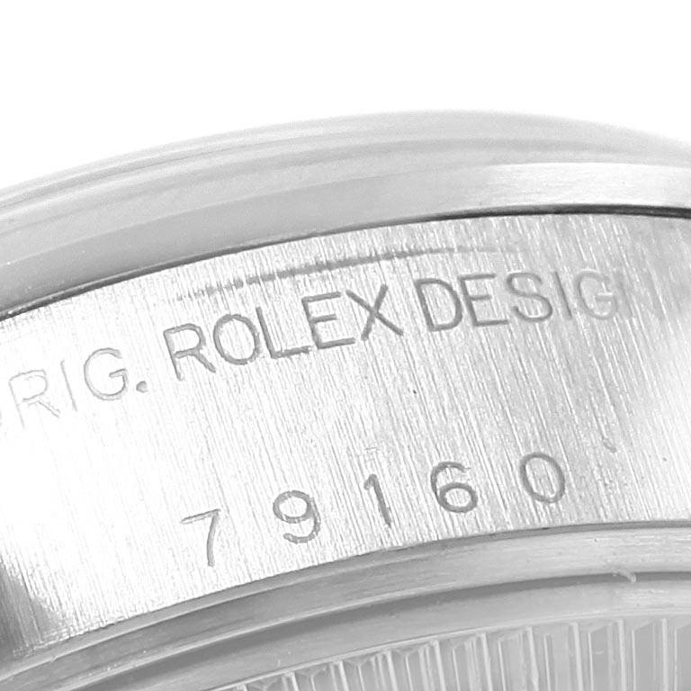 This image shows a close-up of the case side and bezel on a Rolex Datejust 79160 Women's Stainless Steel Silver Dial 79160 Women's Stainless Steel Silver Dial model, highlighting the engraved serial and model numbers.