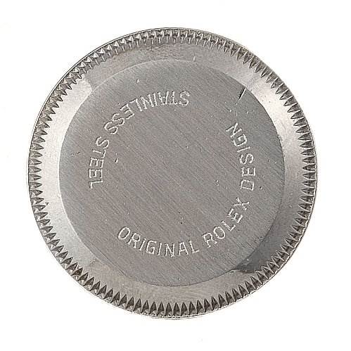 The image shows the back casing of a Rolex Datejust 69173 Women's Yellow Gold Champagne Dial 69173 Women's Yellow Gold Champagne Dial watch, displaying the engravings "STAINLESS STEEL" and "ORIGINAL ROLEX DESIGN".