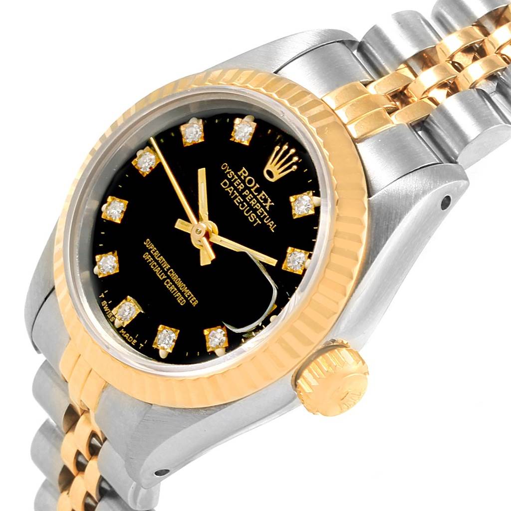 This image shows a close-up, angled view of a Rolex Datejust 69173 Women's Stainless Steel Black Dial 69173 Women's Stainless Steel Black Dial, highlighting the dial, crown, bezel, and bracelet with a black dial and diamond markers.