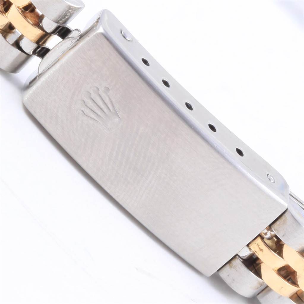 This image shows a close-up of the clasp on a Rolex Datejust 69173 Women's Stainless Steel Black Dial 69173 Women's Stainless Steel Black Dial watch bracelet.