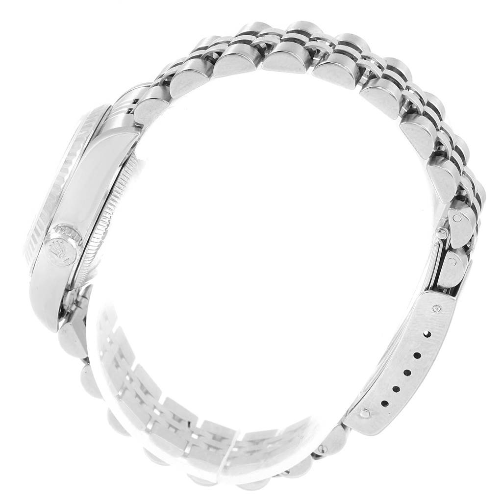 The image shows a side view of the Rolex Datejust 79174 Women's Stainless Steel Mother of Pearl Dial 79174 Women's Stainless Steel Mother of Pearl Dial watch, focusing on its bracelet and crown.