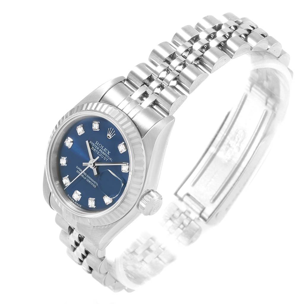 The image shows a Rolex Datejust 79174 Women's Stainless Steel Blue Dial 79174 Women's Stainless Steel Blue Dial watch from an angled view, highlighting the dial, crown, and part of the bracelet.