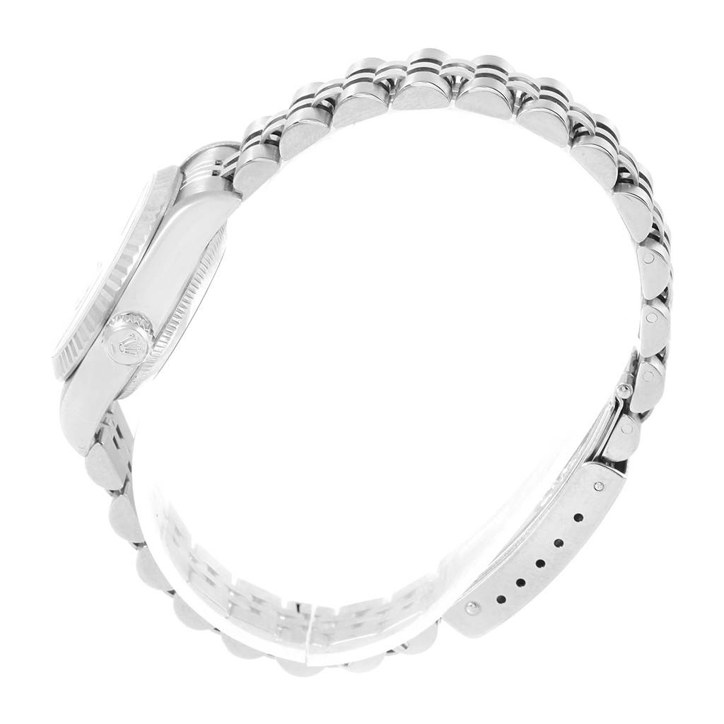 This image shows a side view of a Rolex Datejust 79174 Women
s Stainless Steel Silver Dial 79174 Women
s Stainless Steel Silver Dial watch, focusing on the case and bracelet.