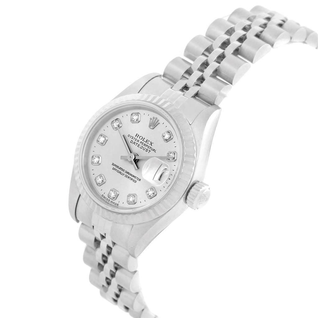 The image shows a Rolex Datejust 79174 Women
s Stainless Steel Silver Dial 79174 Women
s Stainless Steel Silver Dial watch angled slightly from the top with a visible dial, bezel, crown, and bracelet.