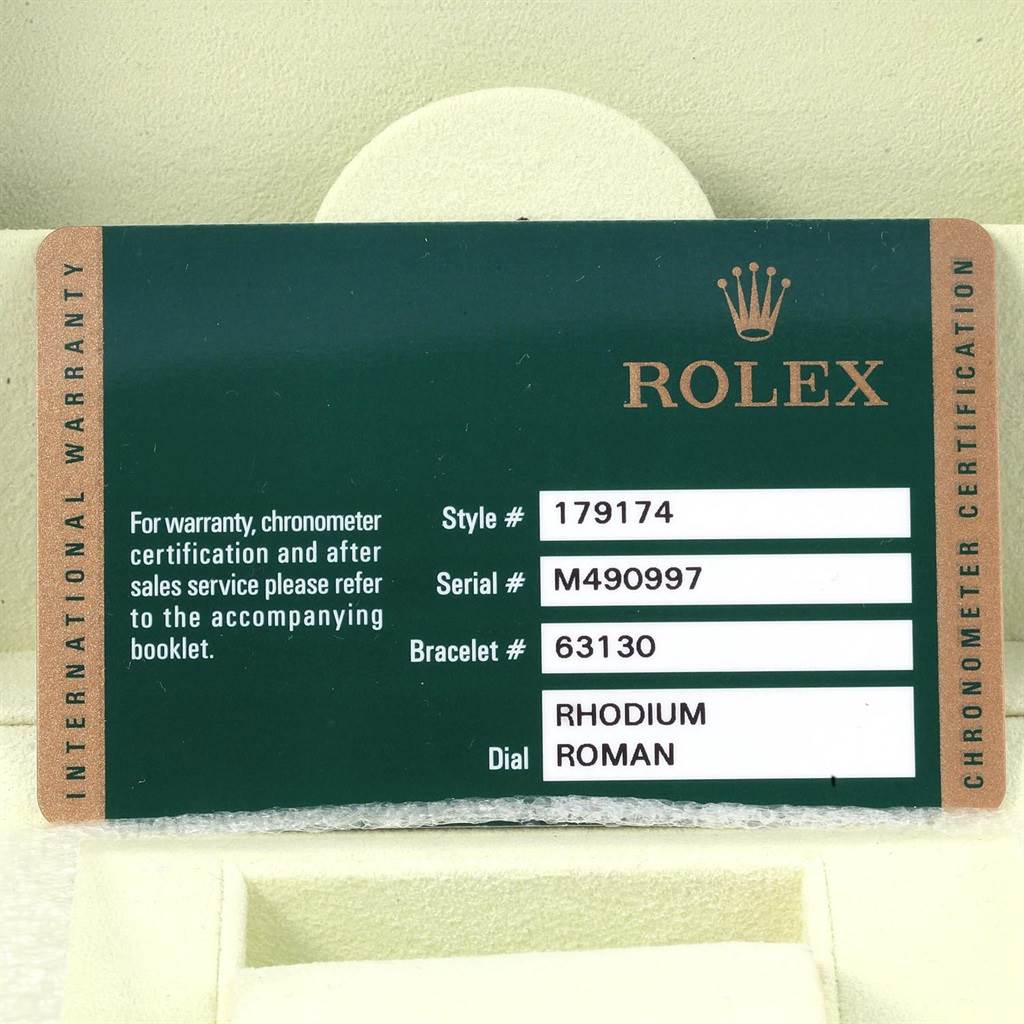 The image shows the warranty card for a Rolex Datejust 179174 Women
s Stainless Steel Silver Dial 179174 Women
s Stainless Steel Silver Dial watch, detailing style, serial, and bracelet numbers, and dial type.