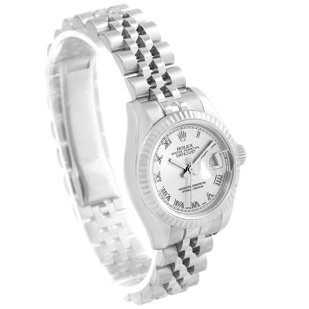 The Rolex Datejust 179174 Women
s Stainless Steel Silver Dial 179174 Women
s Stainless Steel Silver Dial watch is shown at an angled view, displaying the face, bezel, and part of the bracelet.