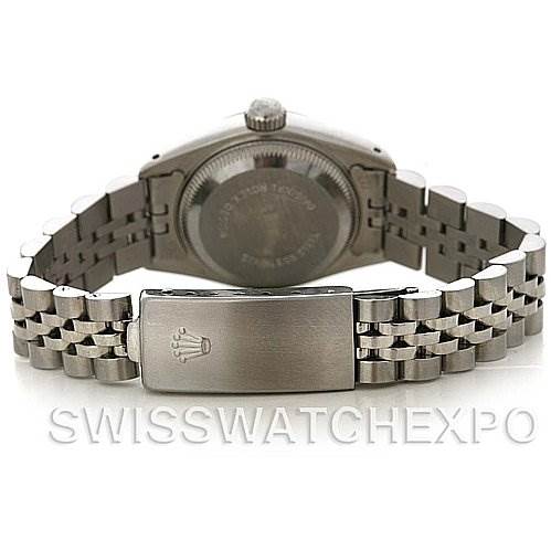 The image shows the backside of a Rolex Datejust 69174 Women's Stainless Steel Silver Dial 69174 Women's Stainless Steel Silver Dial watch, highlighting the bracelet and the clasp with the Rolex logo.