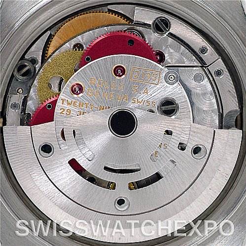 This image shows the movement mechanism of a Rolex Datejust 69174 Women's Stainless Steel Silver Dial 69174 Women's Stainless Steel Silver Dial watch, including gears and the rotor.