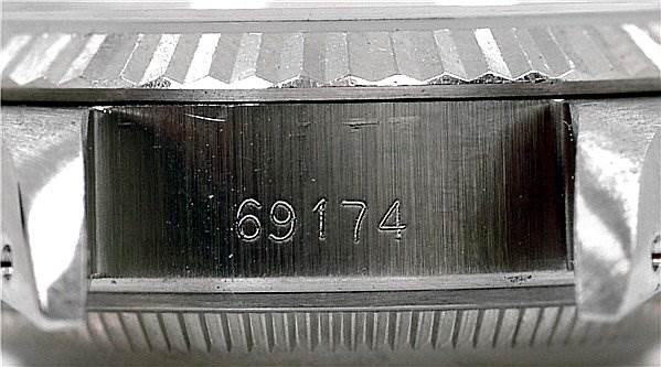 The image shows a close-up of the model number "69174" engraved on the case side of a Rolex Datejust 69174 Women's Stainless Steel Silver Dial 69174 Women's Stainless Steel Silver Dial watch.