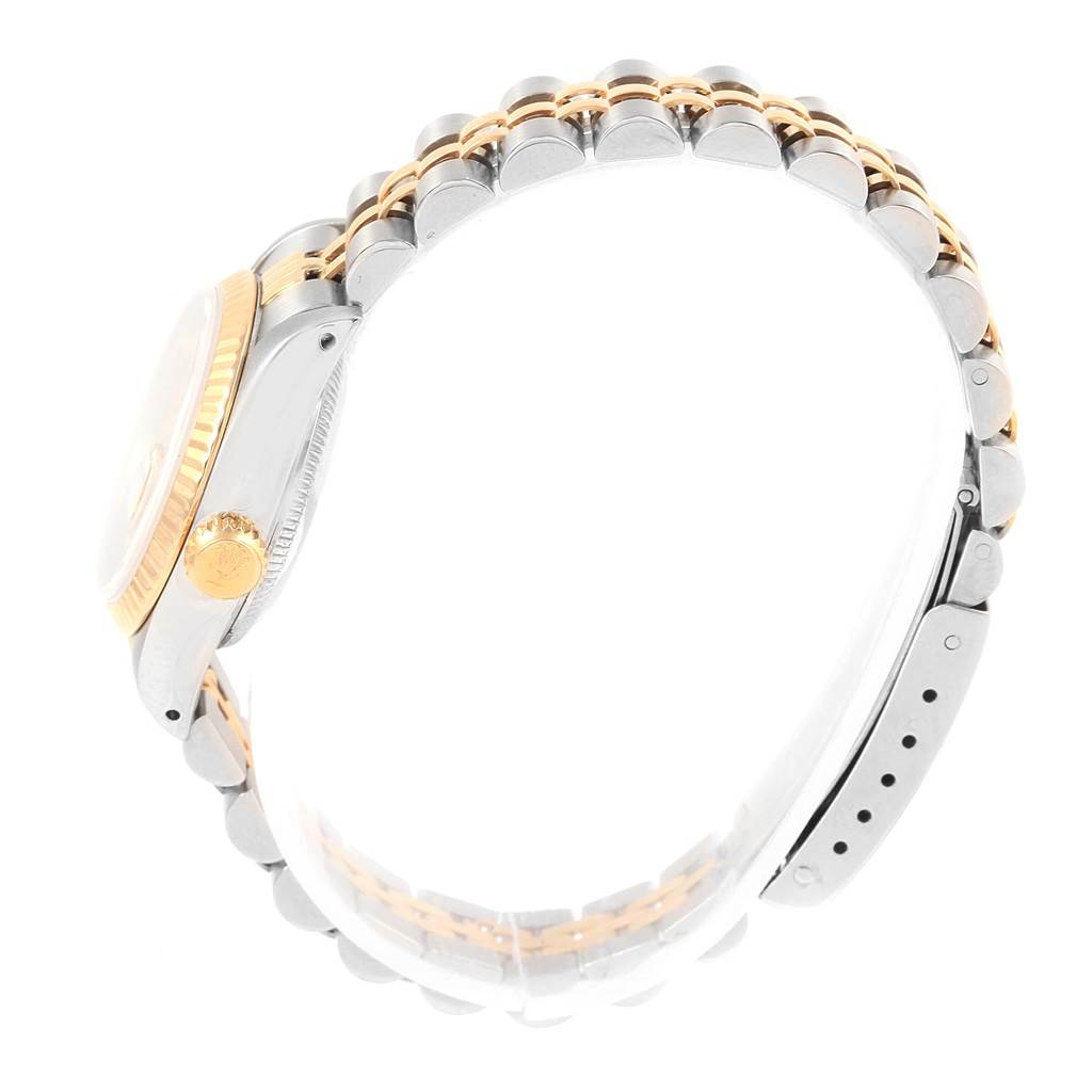 The image shows a Rolex Datejust 69173 Women's Stainless Steel Champagne Dial 69173 Women's Stainless Steel Champagne Dial watch from a side angle, highlighting the crown, case, and bracelet.