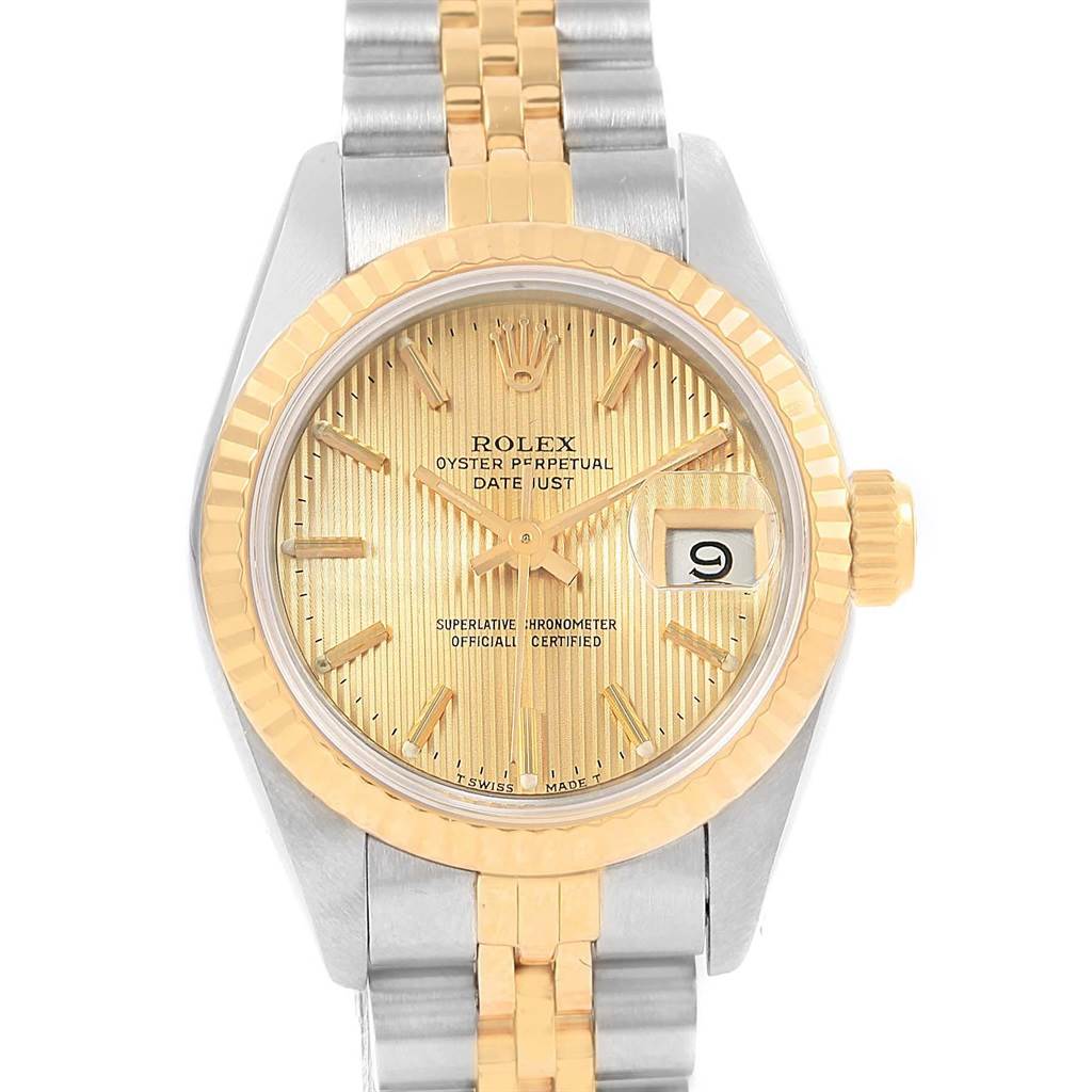 The image shows a close-up of the Rolex Datejust 69173 Women's Stainless Steel Champagne Dial 69173 Women's Stainless Steel Champagne Dial watch's dial, bezel, and bracelet from a front angle.