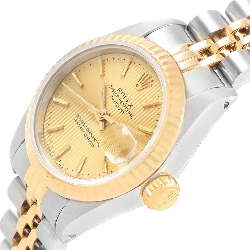 The Rolex Datejust 69173 Women's Stainless Steel Champagne Dial 69173 Women's Stainless Steel Champagne Dial watch is shown at an angled close-up, highlighting the dial, bezel, crown, and part of the bracelet.