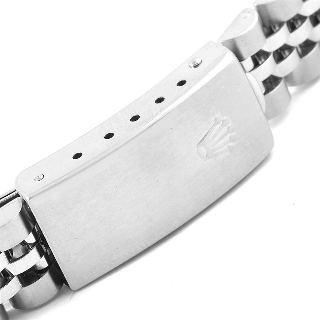 This image shows the clasp and part of the jubilee bracelet of the Rolex Datejust 79174 Women
s Stainless Steel Blue Dial 79174 Women
s Stainless Steel Blue Dial watch from an angled close-up view.