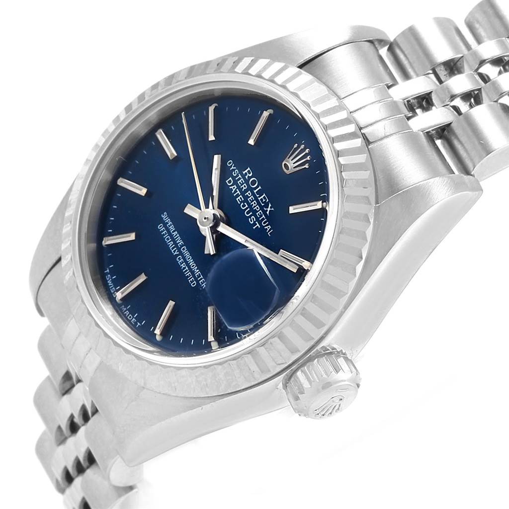 The image shows a close-up view of a Rolex Datejust 79174 Women
s Stainless Steel Blue Dial 79174 Women
s Stainless Steel Blue Dial watch, highlighting the blue dial, stainless steel case, and link bracelet.
