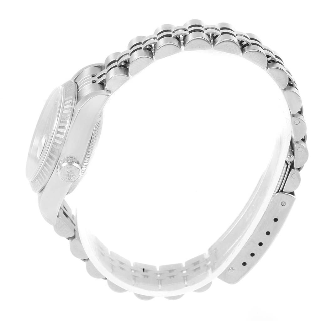 The image shows a side view of the Rolex Datejust 79174 Women
s Stainless Steel Blue Dial 79174 Women
s Stainless Steel Blue Dial watch, focusing on the bracelet, case side, and crown.