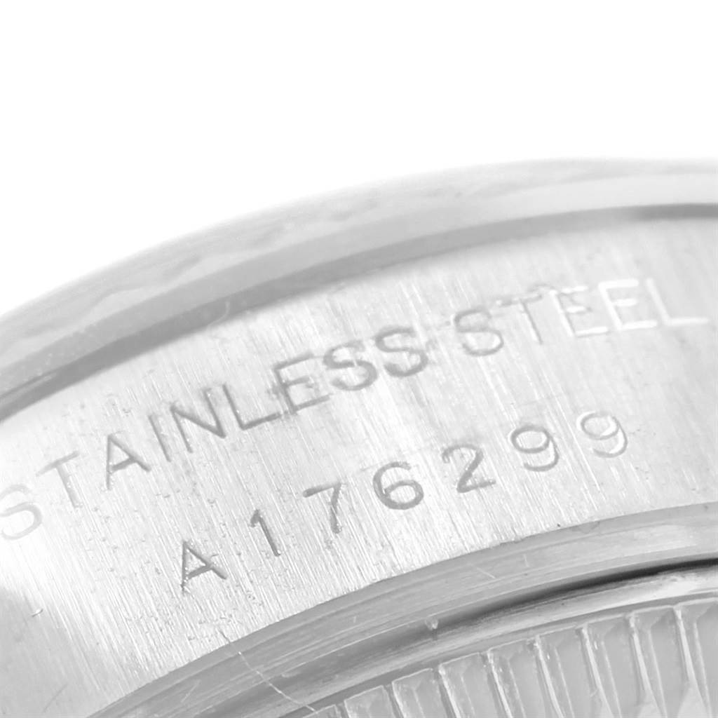 This close-up image shows the case back details of a Rolex Datejust 79174 Women
s Stainless Steel Blue Dial 79174 Women
s Stainless Steel Blue Dial watch, highlighting the stainless steel material and serial number.