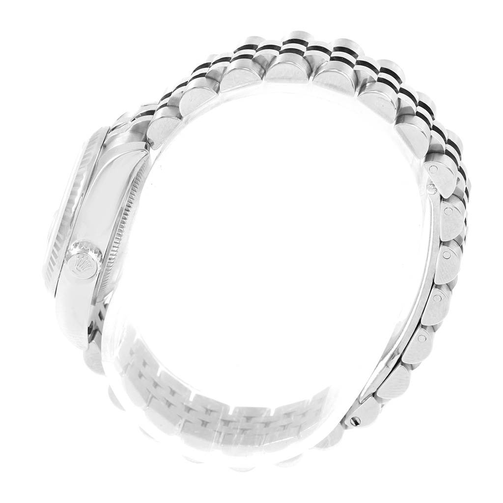 The image shows a side view of the Rolex Datejust 179174 Women's Stainless Steel Silver Dial 179174 Women's Stainless Steel Silver Dial model watch, focusing on the bracelet and the crown.