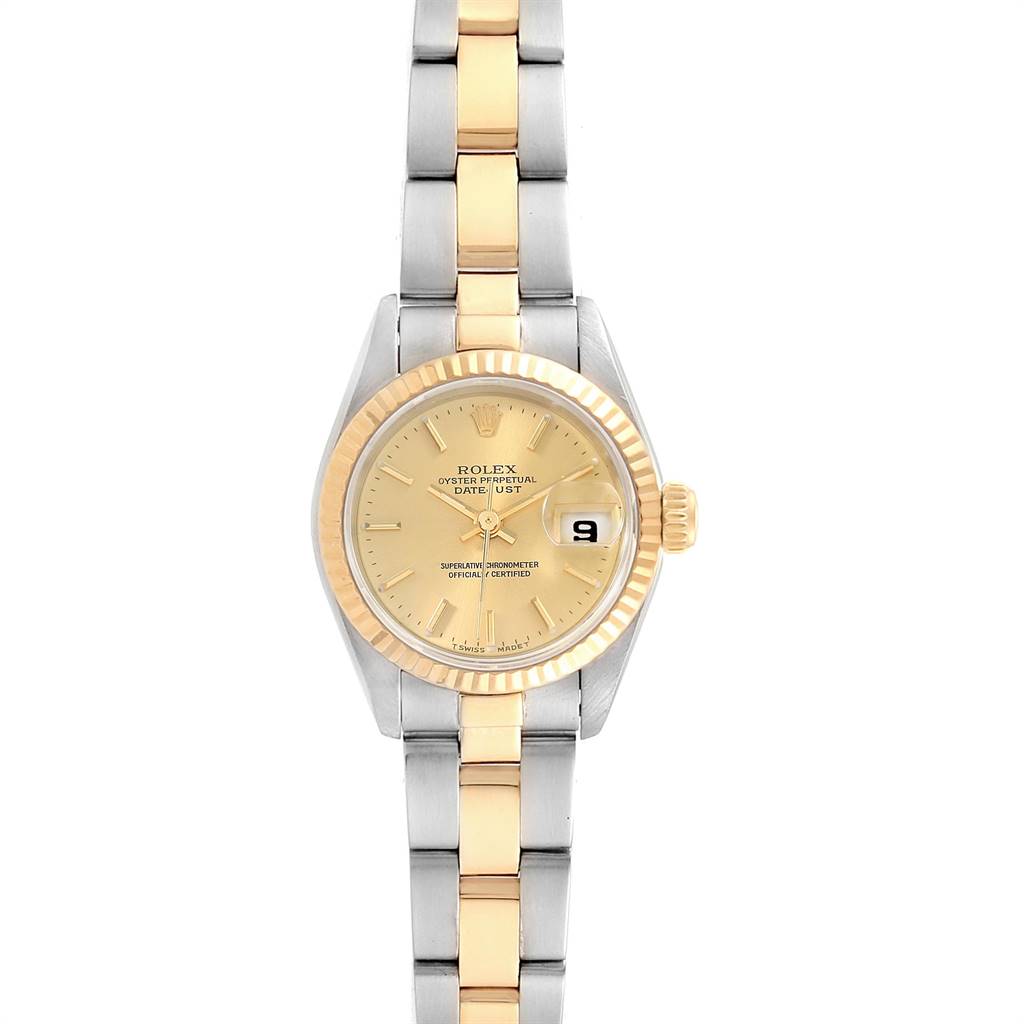 This Rolex Datejust 69173 Women's Steel and Gold (two tone) Champagne Dial 69173 Women's Steel and Gold (two tone) Champagne Dial watch is shown from a top-down angle, displaying its two-tone band, dial, and fluted bezel.