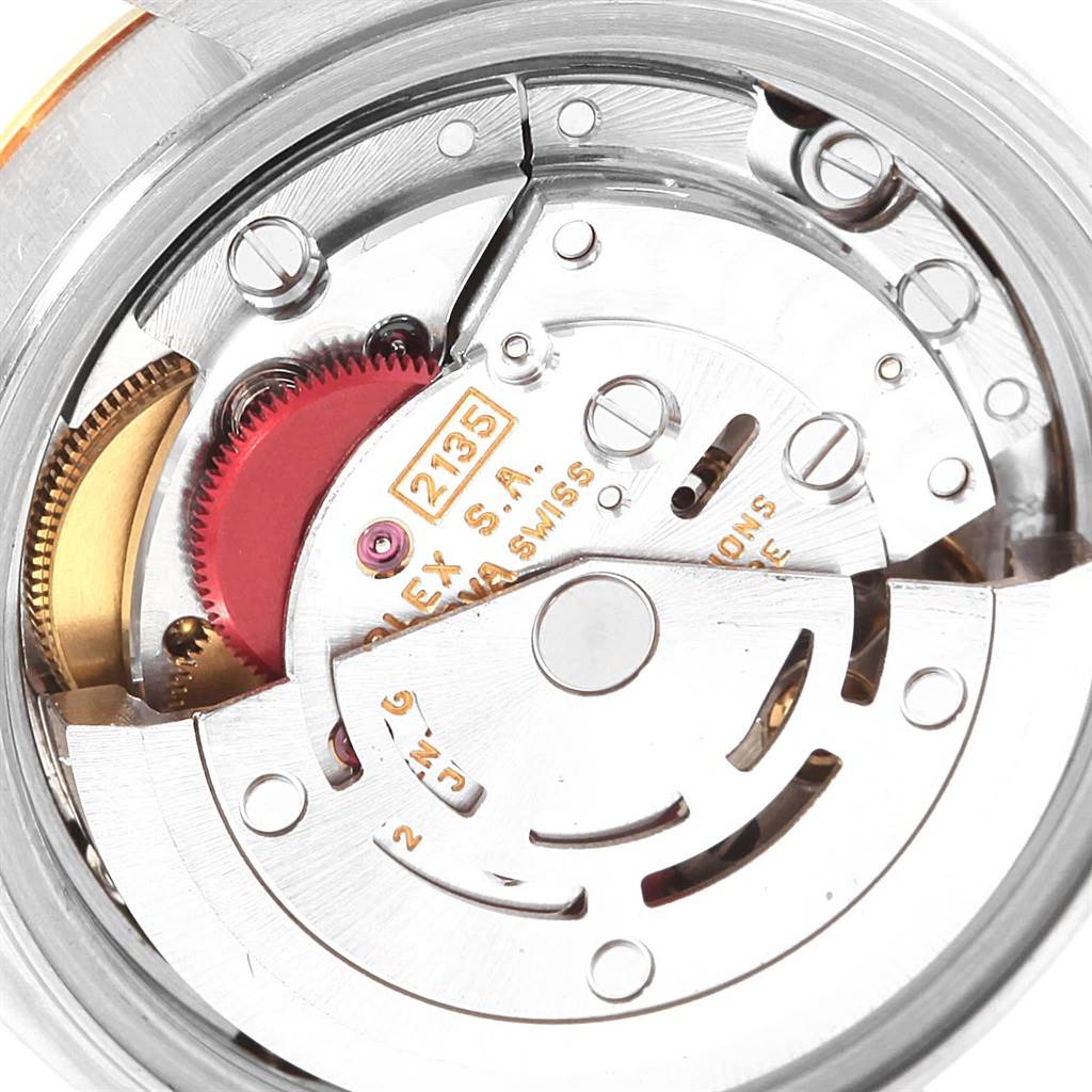 This image shows a close-up view of the movement mechanism inside a Rolex Datejust 69173 Women
s Stainless Steel White Dial 69173 Women
s Stainless Steel White Dial watch.