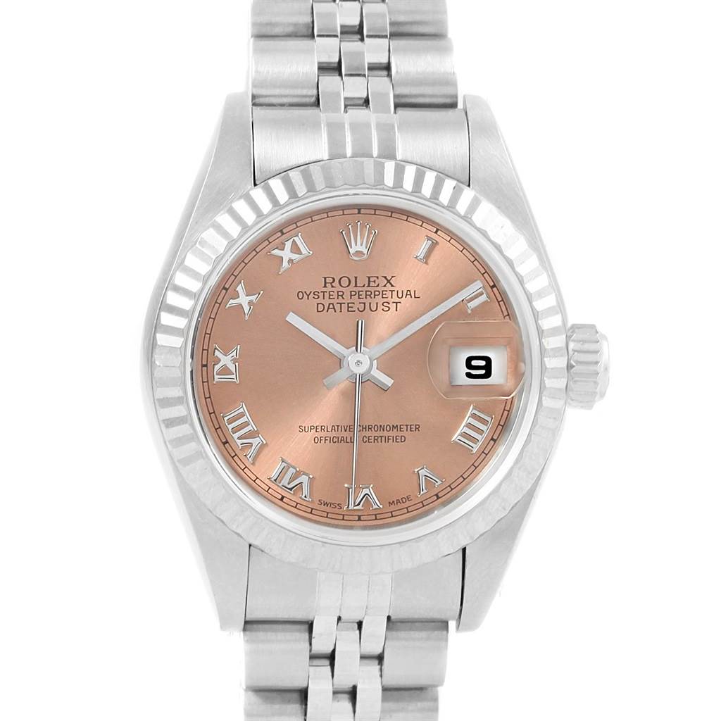 This image shows a frontal view of the Rolex Datejust 79174 Women
s Stainless Steel Pink Dial 79174 Women
s Stainless Steel Pink Dial watch, highlighting the dial, fluted bezel, and metal bracelet.