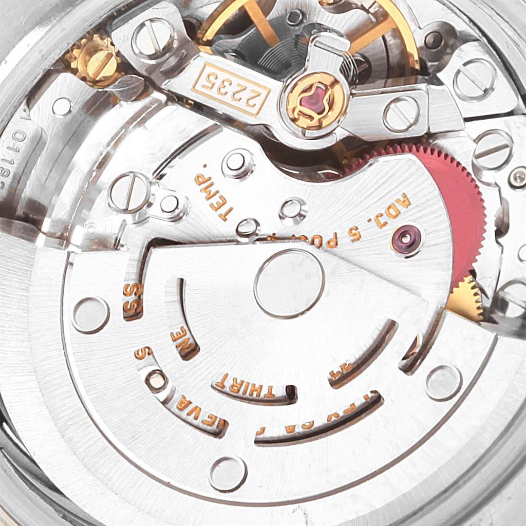 This image shows a close-up of the Rolex Datejust 79174 Women
s Stainless Steel Pink Dial 79174 Women
s Stainless Steel Pink Dial
s movement and internal components at a detailed angle.