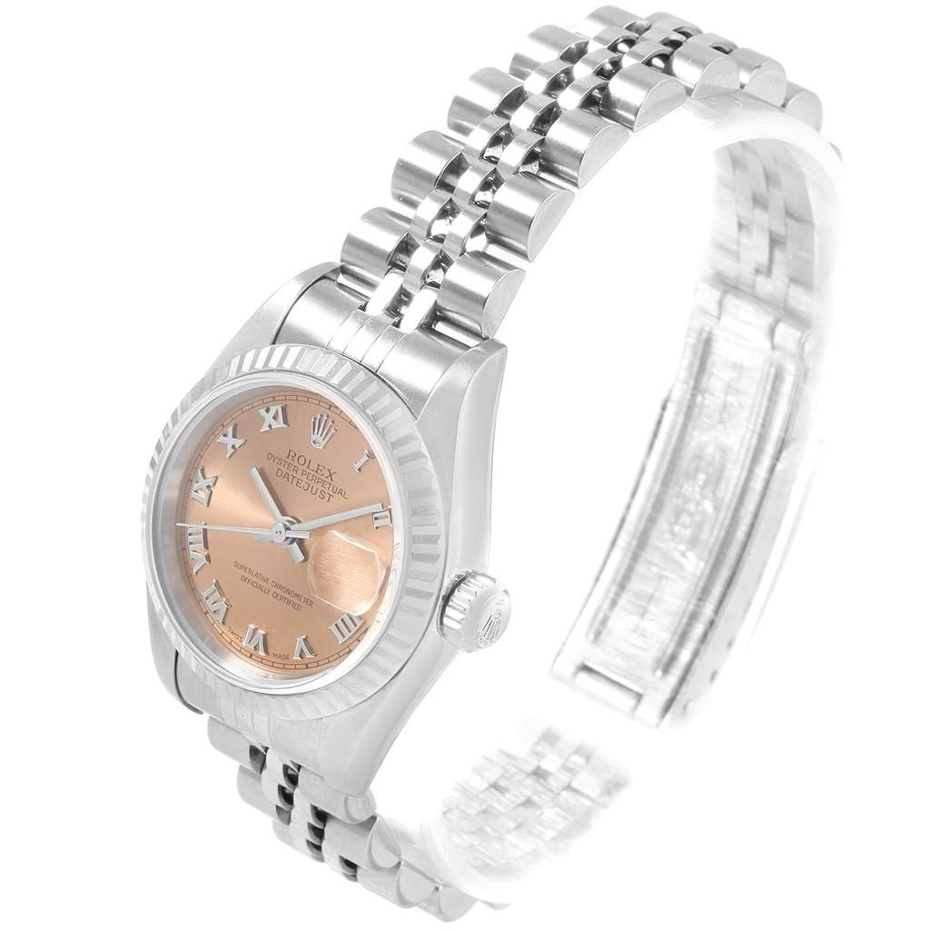 The image shows a Rolex Datejust 79174 Women
s Stainless Steel Pink Dial 79174 Women
s Stainless Steel Pink Dial watch angled from the front-left, highlighting its face, dial, bezel, and bracelet.