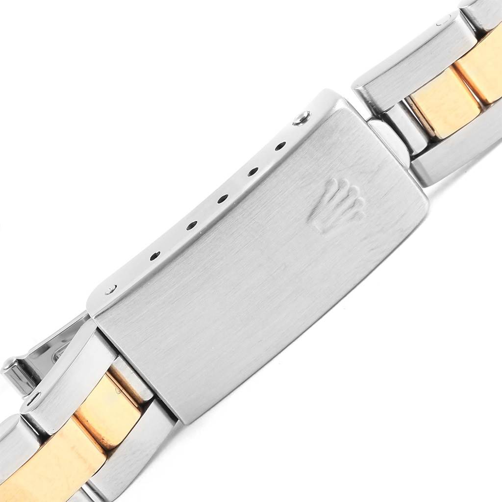 The image shows the clasp and part of the two-tone bracelet of a Rolex Datejust 79163 Women's Steel and Gold (two tone) White Dial 79163 Women's Steel and Gold (two tone) White Dial watch.