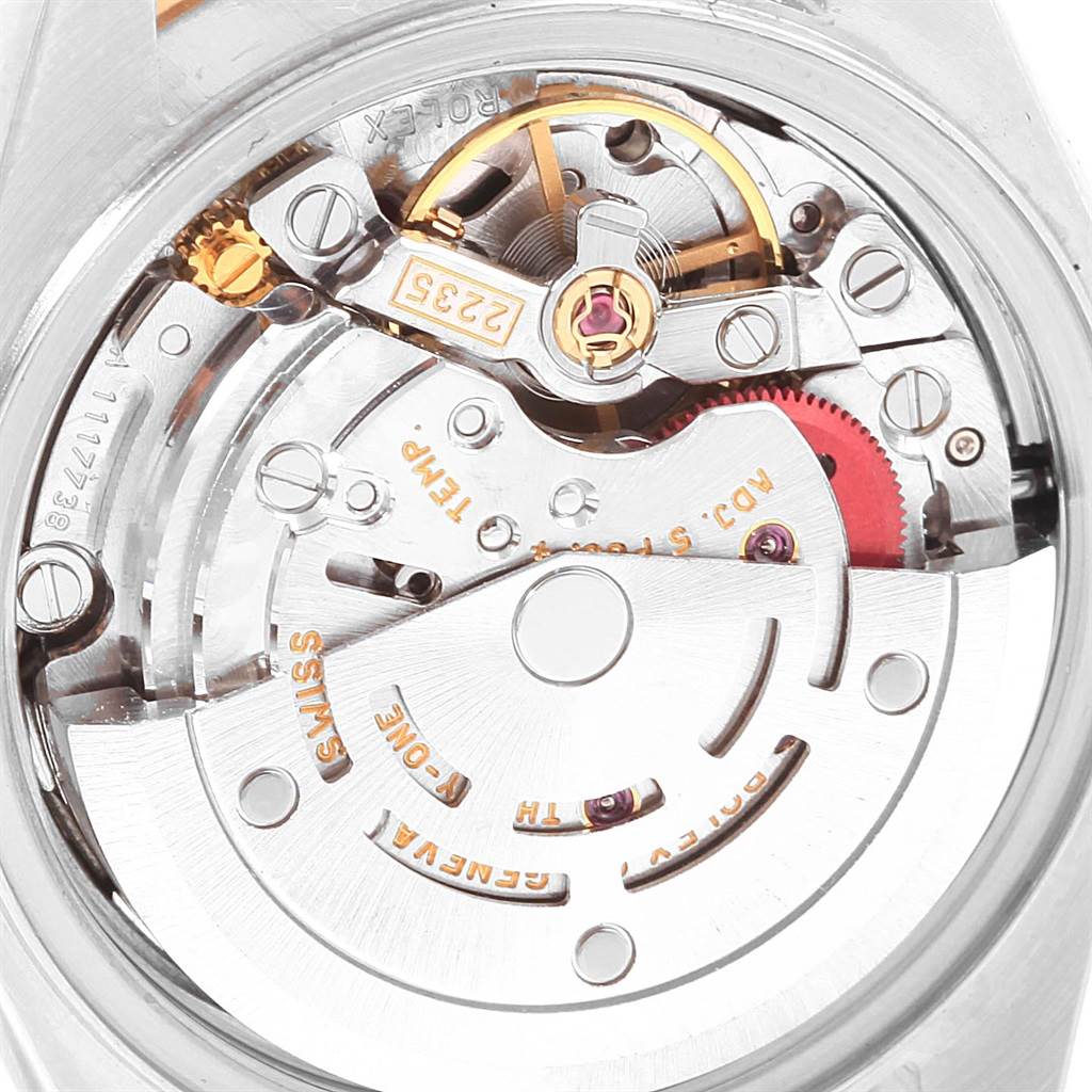 The image shows the intricate internal mechanism and movement of a Rolex Datejust 79163 Women's Steel and Gold (two tone) White Dial 79163 Women's Steel and Gold (two tone) White Dial watch viewed from the back.