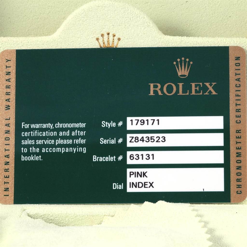 This image shows the warranty and certification card for a Rolex Datejust 179171 Women's Steel and Gold (two tone) Pink Dial 179171 Women's Steel and Gold (two tone) Pink Dial with details on style, serial, and bracelet numbers.