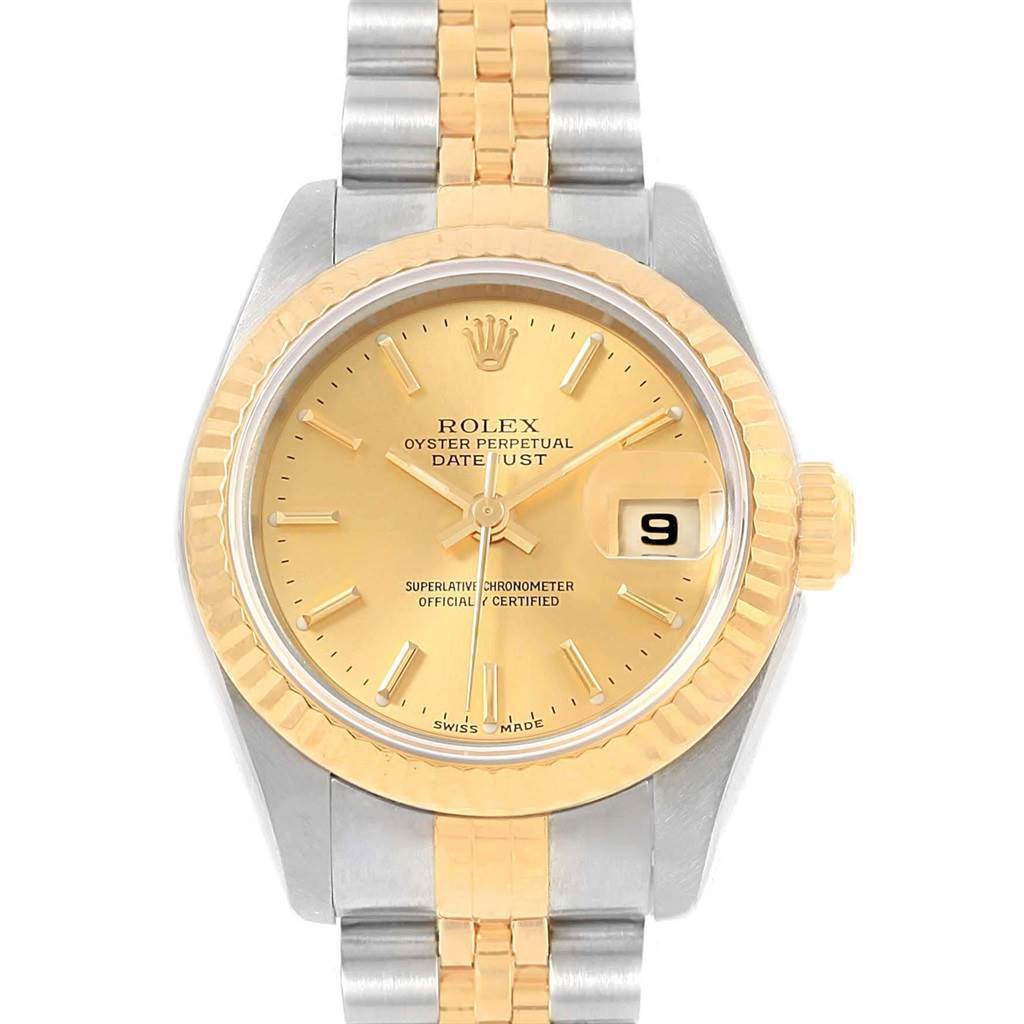 The image shows a front view of a Rolex Datejust 79173 Women's Steel and Gold (two tone) Champagne Dial 79173 Women's Steel and Gold (two tone) Champagne Dial watch with a gold bezel, gold dial, and a two-tone gold and silver bracelet.