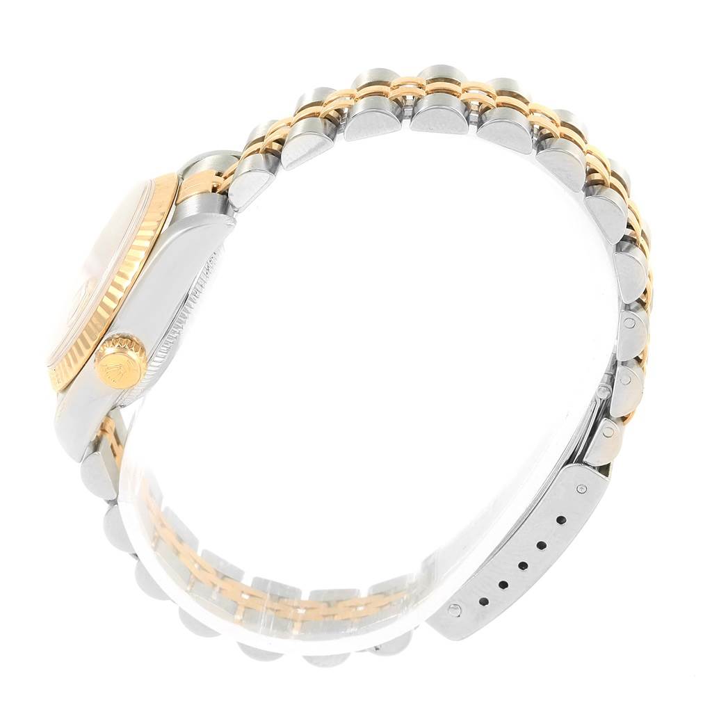 The image shows a side profile of a Rolex Datejust 79173 Women's Steel and Gold (two tone) Champagne Dial 79173 Women's Steel and Gold (two tone) Champagne Dial watch, focusing on the two-tone bracelet and case.