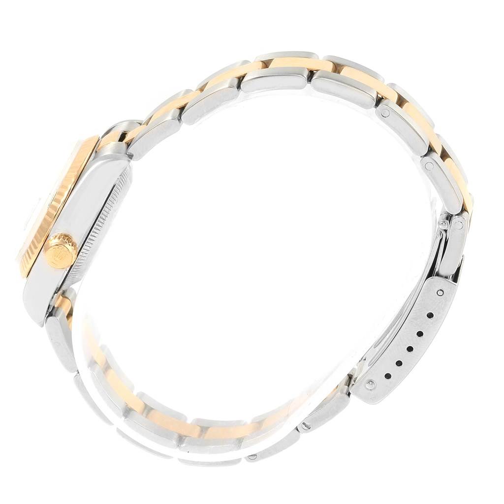 The image shows a side view of a Rolex Datejust 69173 Women
s Stainless Steel Champagne Dial 69173 Women
s Stainless Steel Champagne Dial watch, highlighting the case, bezel, crown, and bracelet.