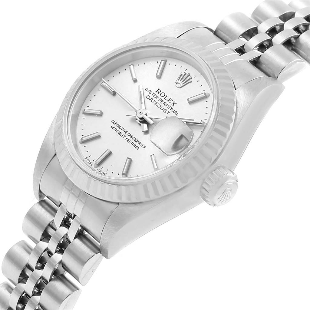 This image shows a Rolex Datejust 79174 Women
s Stainless Steel Silver Dial 79174 Women
s Stainless Steel Silver Dial watch at an oblique angle, highlighting the dial, fluted bezel, crown, and part of the bracelet.
