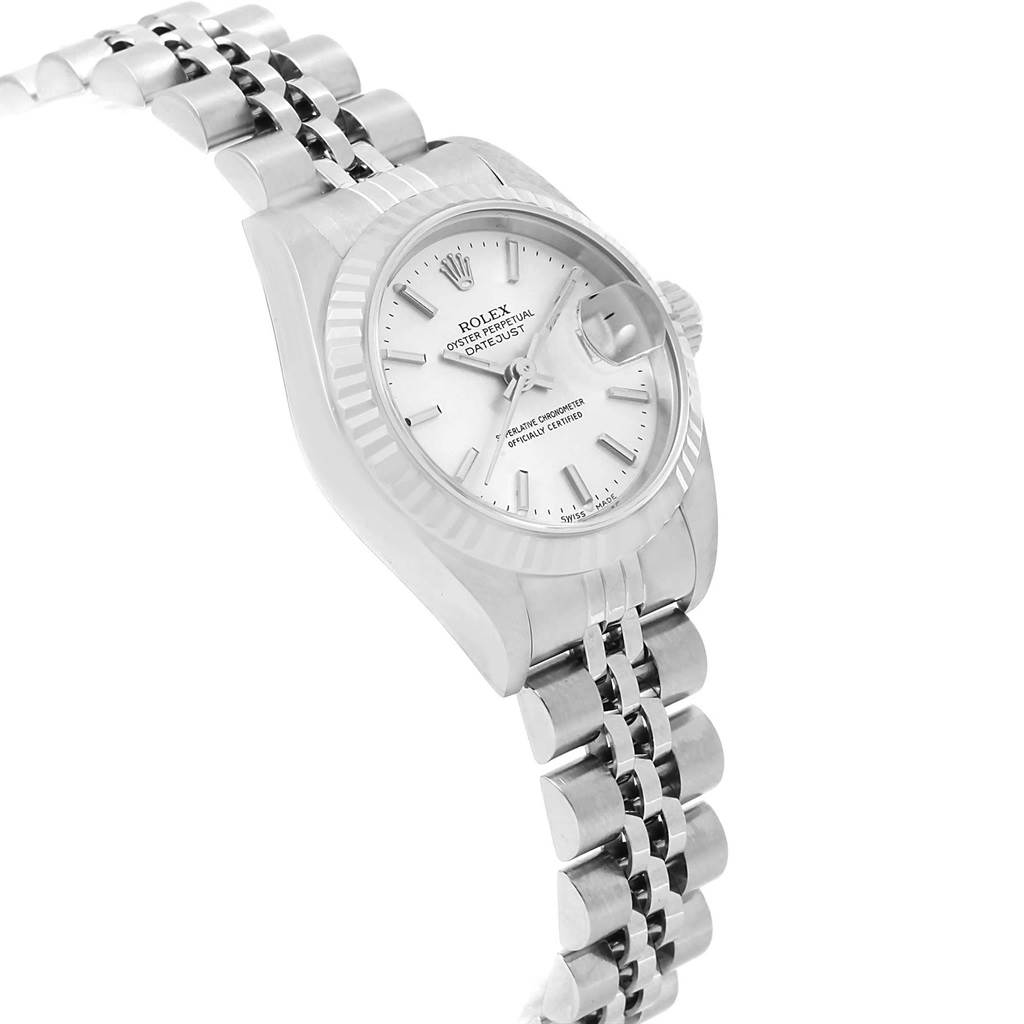 This image shows a side angle of the Rolex Datejust 79174 Women
s Stainless Steel Silver Dial 79174 Women
s Stainless Steel Silver Dial watch, featuring its bracelet, case, dial, and fluted bezel.