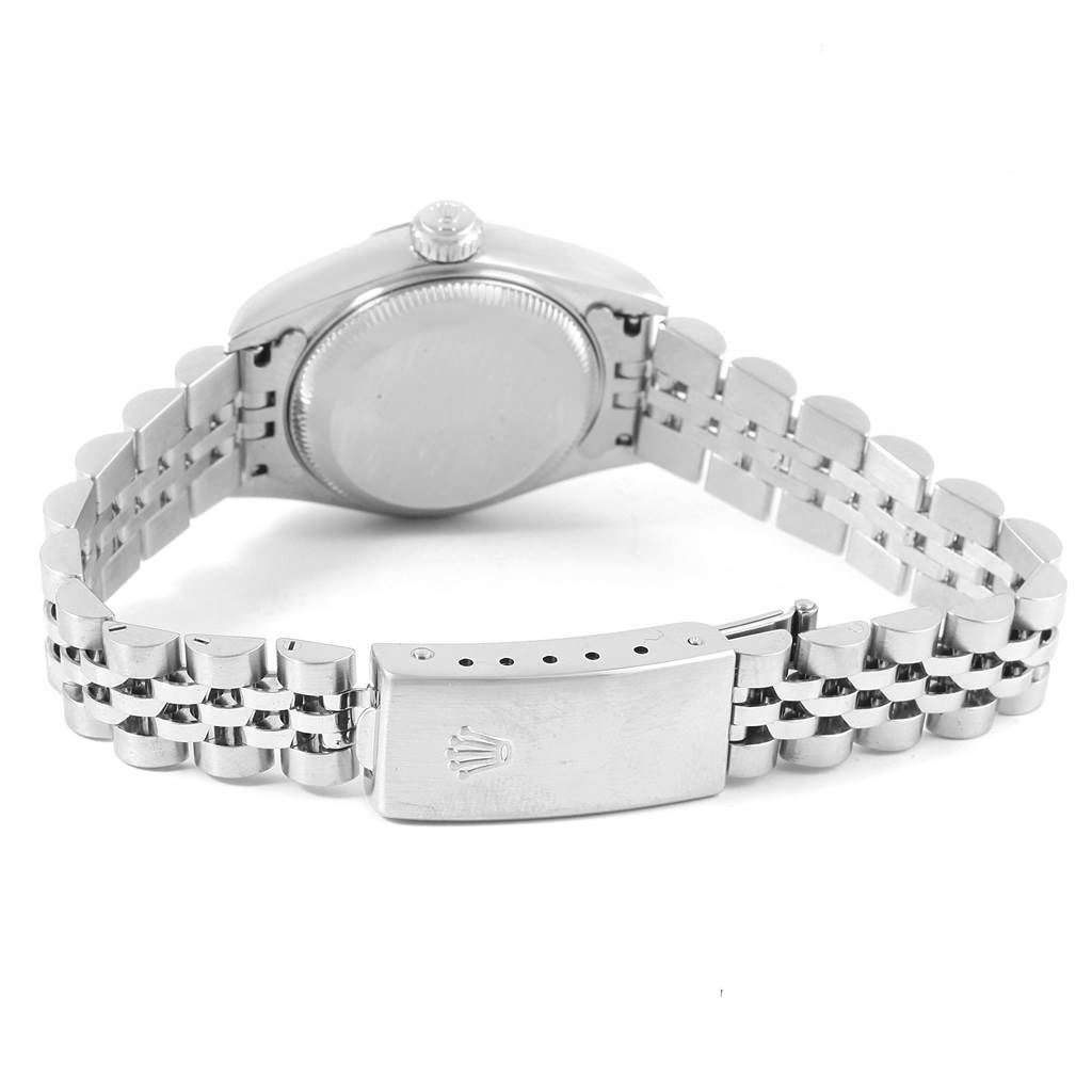 The image shows the back view of a Rolex Datejust 79174 Women
s Stainless Steel Silver Dial 79174 Women
s Stainless Steel Silver Dial watch, highlighting its case back and Jubilee bracelet with the clasp.