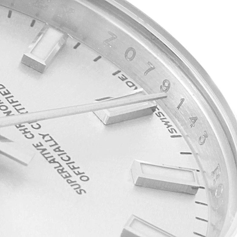 This close-up of a Rolex Datejust 179160 Women's Stainless Steel Silver Dial 179160 Women's Stainless Steel Silver Dial watch shows part of the dial, hands, and markers at an oblique angle.