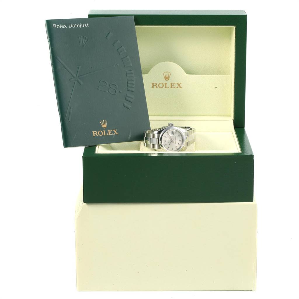 The image shows a Rolex Datejust 179160 Women's Stainless Steel Silver Dial 179160 Women's Stainless Steel Silver Dial watch in an open green box with a manual leaning against the lid.