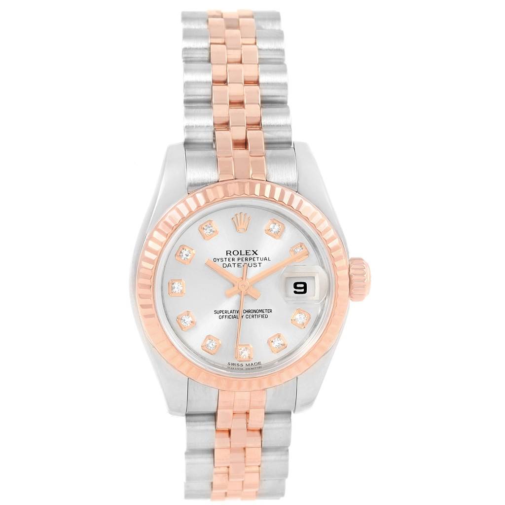 The image shows a Rolex Datejust 179171 Women
s Steel and Gold (two tone) Silver Dial 179171 Women
s Steel and Gold (two tone) Silver Dial watch from a top view, featuring a silver and rose gold bracelet, luminescent hands, and date display.