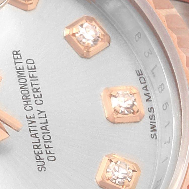 This close-up view showcases the dial and diamond hour markers of the Rolex Datejust 179171 Women
s Steel and Gold (two tone) Silver Dial 179171 Women
s Steel and Gold (two tone) Silver Dial watch.