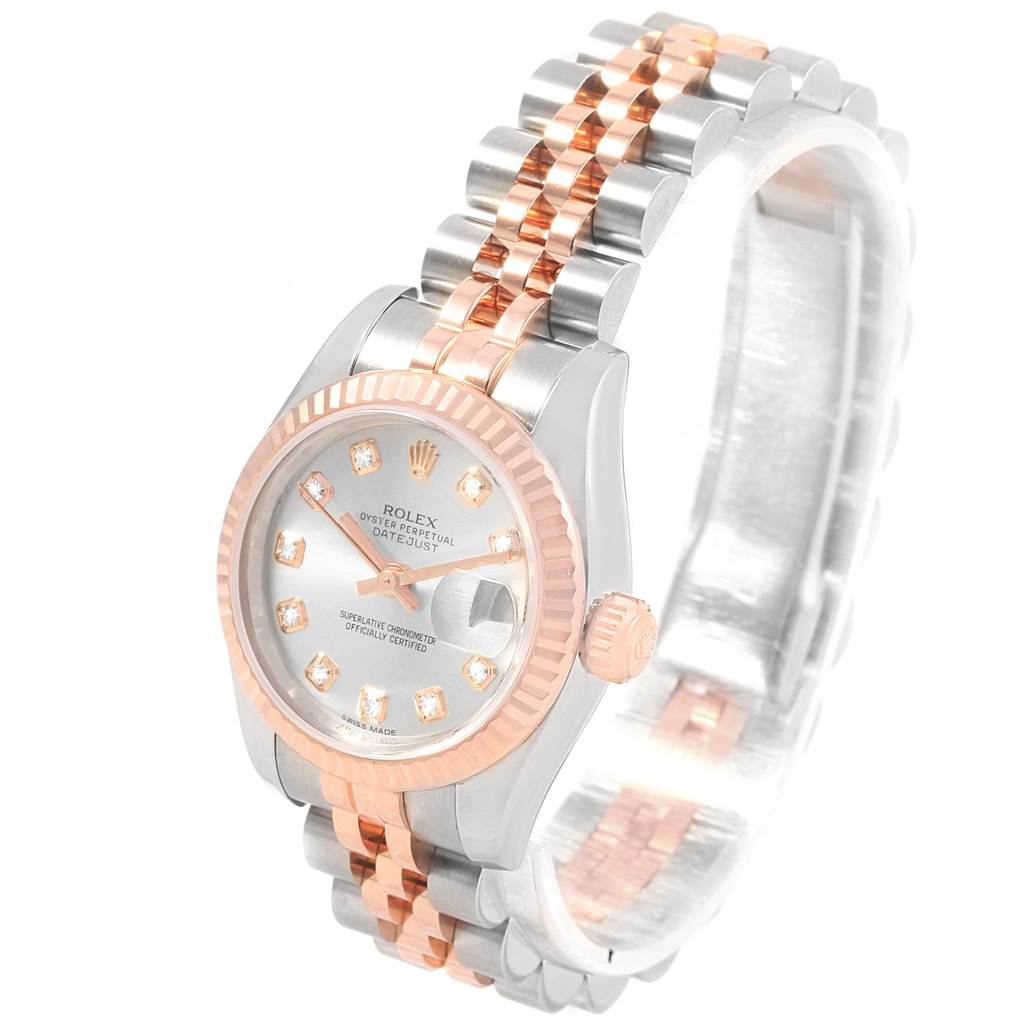 This image shows a Rolex Datejust 179171 Women
s Steel and Gold (two tone) Silver Dial 179171 Women
s Steel and Gold (two tone) Silver Dial watch from a side angle, highlighting the face, crown, and two-tone bracelet.