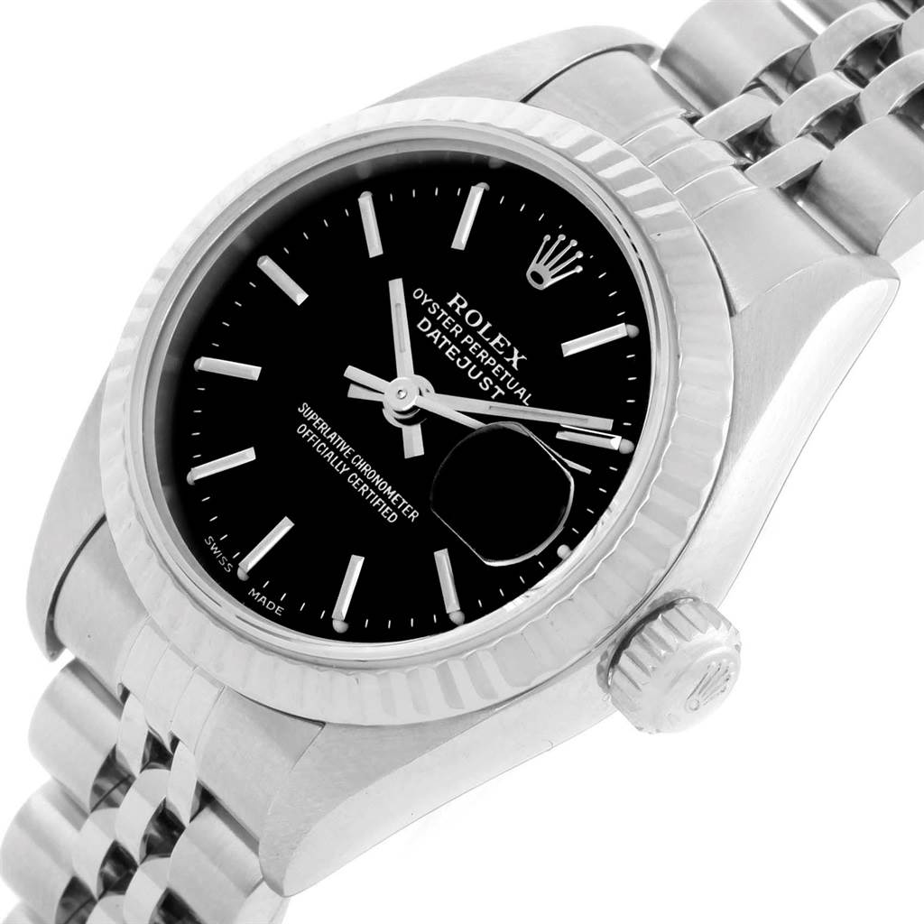 The image shows a close-up, angled view of a Rolex Datejust 79174 Women's Stainless Steel Black Dial 79174 Women's Stainless Steel Black Dial watch, highlighting the dial, bezel, crown, and part of the bracelet.