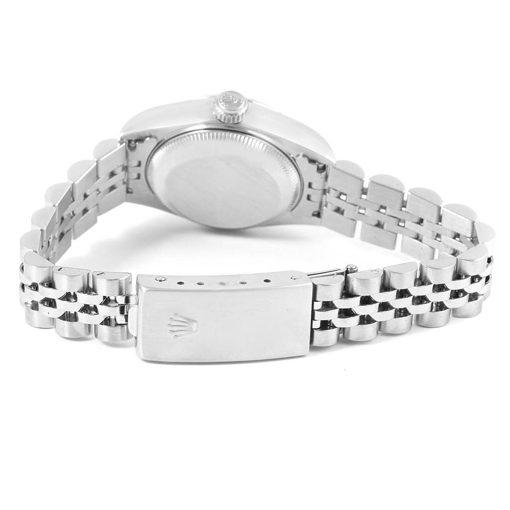 The image shows the back view of a Rolex Datejust 79174 Women's Stainless Steel Black Dial 79174 Women's Stainless Steel Black Dial watch, highlighting the case back and jubilee bracelet with the clasp.