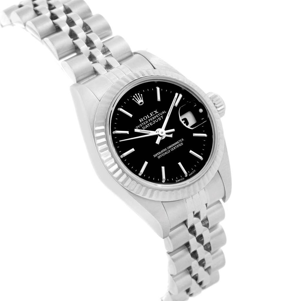 The image shows a Rolex Datejust 79174 Women's Stainless Steel Black Dial 79174 Women's Stainless Steel Black Dial watch at a slight angle, focusing on the face, bezel, crown, and part of the bracelet.