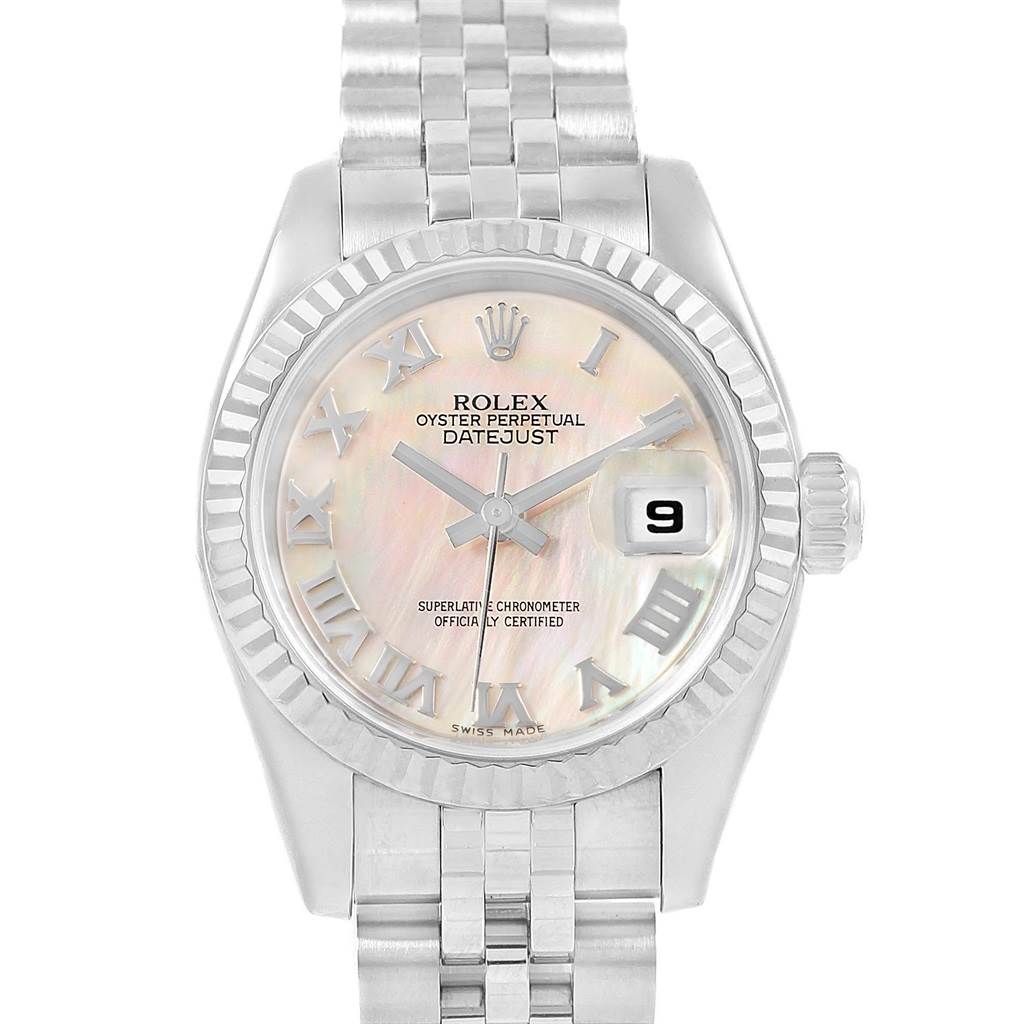 The Rolex Datejust 179174 Women
s Stainless Steel Mother of Pearl Dial 179174 Women
s Stainless Steel Mother of Pearl Dial watch is shown from a front angle, displaying its face, bezel, and bracelet.