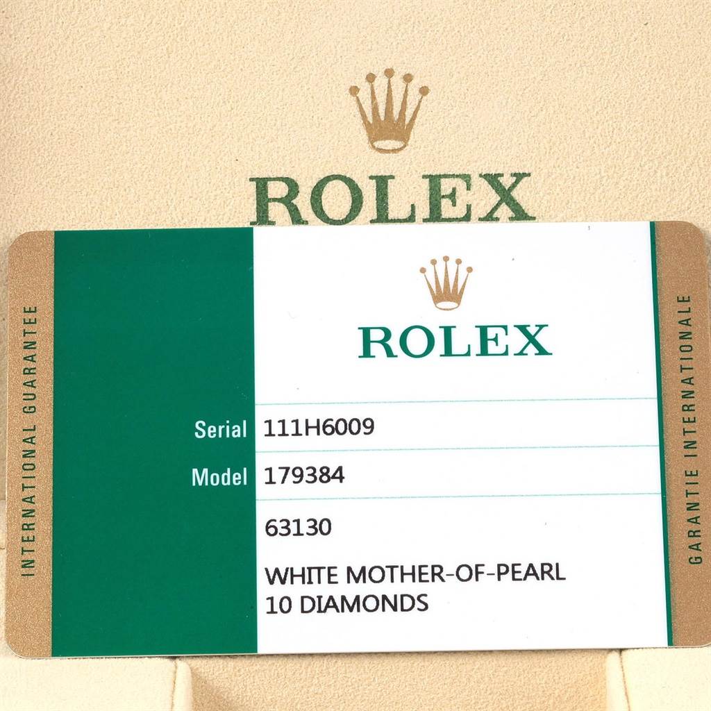 This image shows the warranty card for the Rolex Datejust 179384 Women's Stainless Steel Mother of Pearl Dial 179384 Women's Stainless Steel Mother of Pearl Dial model, highlighting serial number, model number, and dial details.