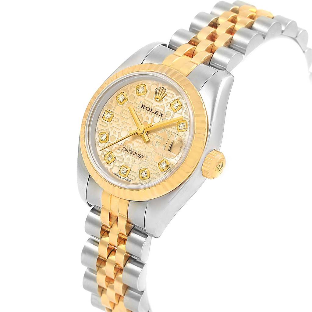 The Rolex Datejust 179173 Women's Steel and Gold (two tone) Champagne Dial 179173 Women's Steel and Gold (two tone) Champagne Dial watch is shown at an angled view, highlighting the dial, crown, and Jubilee bracelet.